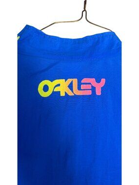 Vintage Oakley Surf Style Thermonuclear Protection Blue Windbreaker Jacket OSFA